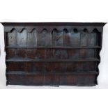 18th century Oak Dresser rack of a boarded back and graduated shelves, width 162cm