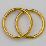 Two 22ct gold wedding rings 9.2g gross.