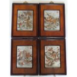 Four Chinese porcelain framed panels painted with figures, 29x30cms.