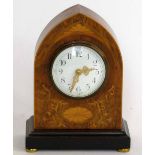 Inlaid rosewood lancet shaped mantel clock with a white enamel dial and balance wheel movement,