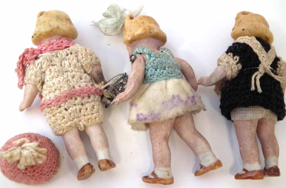 Hertwig bisque Skater doll, together with two other similar dolls, with porcelain jointed legs and - Image 5 of 5