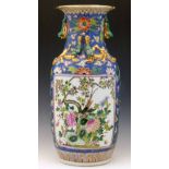Chinese porcelain vase of floral blue ground reserved with floral panels, six character reign mark