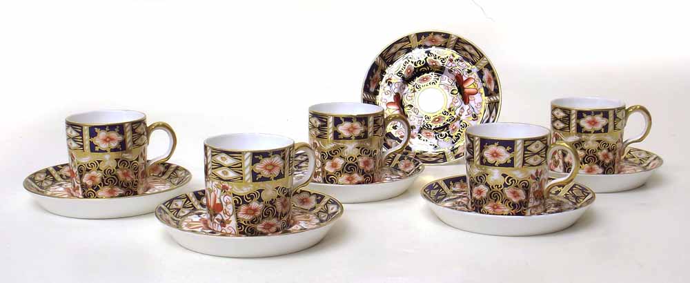 Royal Crown Derby five coffee cans and six saucers. Condition report: see terms and conditions