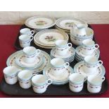 Eight Dressden plates and cake stand, Botanical hand painted decoration and twelve 12 piece tea set.