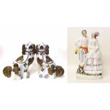 Staffordshire flat back figure 'Sir Richard Burton and Lady Burton' and a pair of dogs. Condition