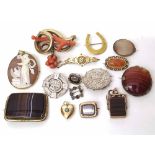 Victorian red coral and gilt metal brooch, four banded agate brooches, 9ct gold horseshoe brooch,