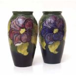 Pair of Moorcroft clematis pattern vases. Condition report: see terms and conditions
