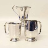 Two silver mugs and a cup. Condition report: see terms and conditions