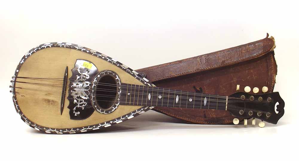 F. Ferrari and Son Neoplitan Bowl Back Mandolin with fluted multi rib back and pearl with case.