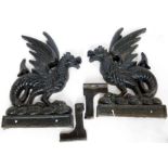 Pair of cast iron griffins, flat backed, height 70cm, together with a pair of brackets Condition