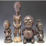 Four Luba / Hemba figures, the tallest measures 59cm high All lots in this Tribal and African Art