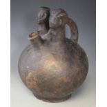 Large terracotta twin headed palm wine vessel possibly Luba, 34cm high All lots in this Tribal and