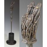 Dogon brass or bronze hairpin modelled with four crouching figures, 35.5cm high All lots in this