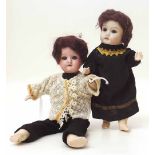 Two small dolls one marked Welsch 7/0, the other 'No. 121 5/0. Condition report: see terms and