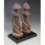 Dogon Ancestral couple, carved kneeling, 37cm high excluding wood base. All lots in this Tribal