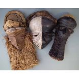 Three Pende masks including a sickness mask, the largest measures All lots in this Tribal and