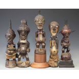 Five Songye Nkisi figures, the tallest measures 35cm high All lots in this Tribal and African Art