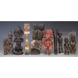 Ten African figures carved in various tribal styles, the tallest figure measures 21.5cm high All