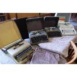 Four old manual typwriters, two Empire Aristocrats, Olivetti Lettra 22 and Hermes 3000. Condition