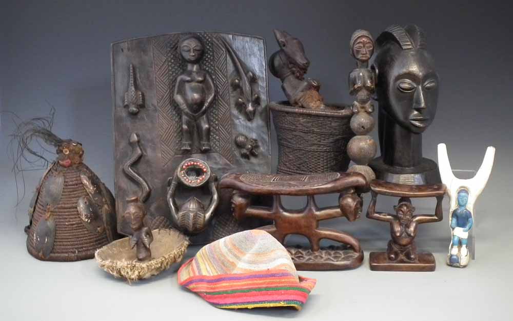 Collection of mixed items, to include two headrests, a plaque, basket shrine figure, carved bust,