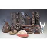 Collection of mixed items, to include two headrests, a plaque, basket shrine figure, carved bust,