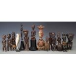 Fourteen African figures carved in various tribal styles, the tallest measures 25cm high All lots in