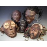 Five Chokwe / Angola masks, the largest measures 30cm high All lots in this Tribal and African Art