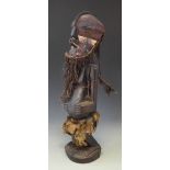 Songye Nkisi power figure wearing Kifwebe mask, 77cm high All lots in this Tribal and African Art