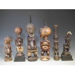 Six Songye Mankishi power figures, the tallest measures 46cm high All lots in this Tribal and