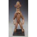 Lobi or Mossi figure, 29cm high All lots in this Tribal and African Art Sale are sold subject to V.