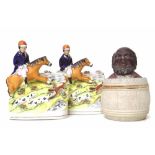 Novelty tabacco jar and a pair of Staffordshire figures Condition report: see terms and conditions