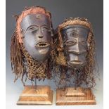 Two Chokwe masks, the largest measures 27cm high excluding base. All lots in this Tribal and African