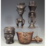 Kuba anthropomorphic janus cup, together with a Yaka palm wine cup and two other figural cups, the