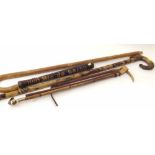 Swain carriage whip, horse measure walking stick, two lady's hunting crops, truncheon and carved