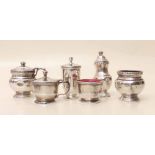 Two three piece silver condiment sets. Condition report: see terms and conditions