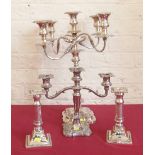 Silver plated candelabra, a pair of candlesticks and another candelabra. Condition report: see terms