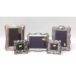 Three 4x5 silver mounted photograph frames and two others. Condition report: see terms and