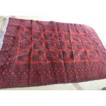 Black and red Iranian style fringed rug 280cm x 190cm. Condition report: see terms and conditions