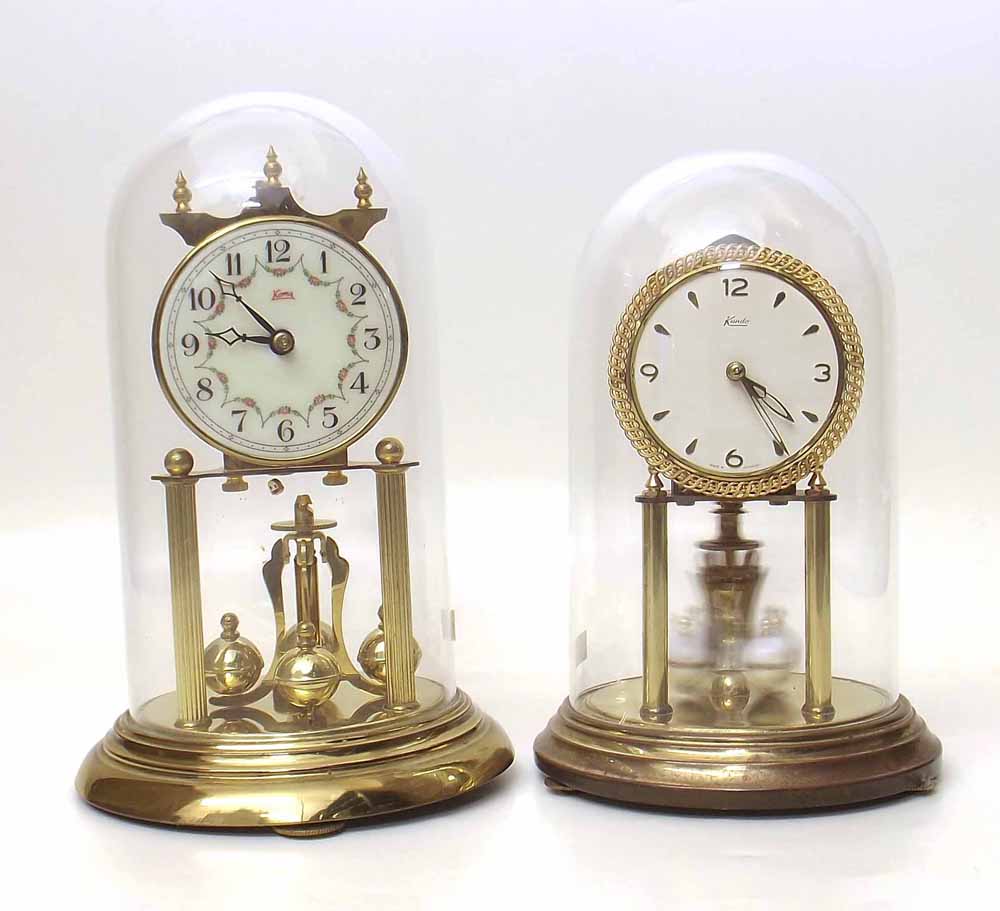 Two 400 day torsion clocks under domes. Condition report: see terms and conditions