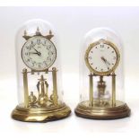 Two 400 day torsion clocks under domes. Condition report: see terms and conditions