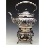 Victorian Britannia metal globular tea kettle and stand embossed with leaves, overall height 40cm.