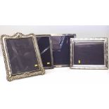 Four 8x10 silver mounted photograph frames. Condition report: see terms and conditions