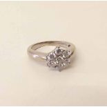 Diamond cluster ring in 18ct white gold Condition report: see terms and conditions