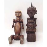 Songye figure and an African puppet probably Lega Condition report: see terms and conditions