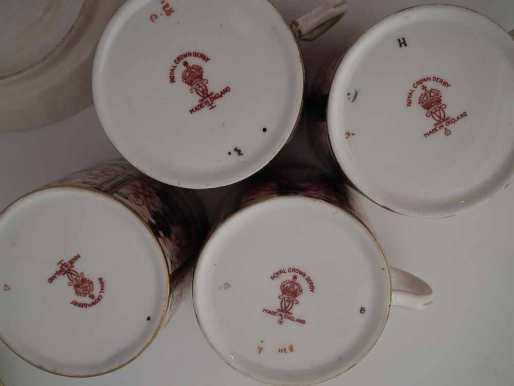 Six Royal Crown Derby coffee cups and saucers, decorated with imari 1128 pattern, date codes ranging - Image 3 of 4