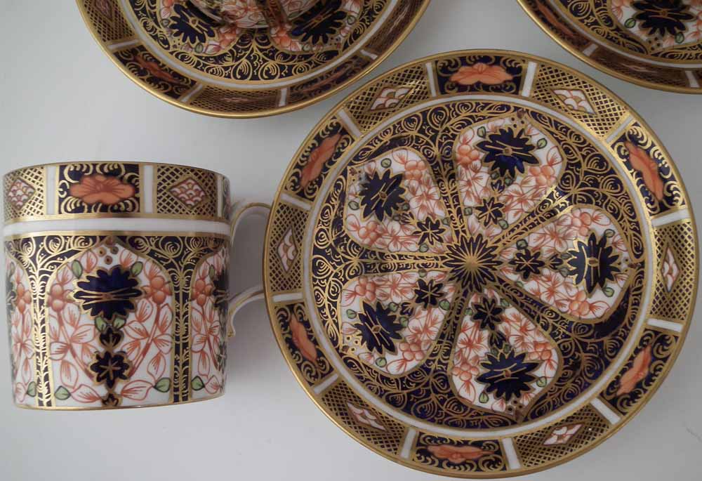 Six Royal Crown Derby coffee cups and saucers, decorated with imari 1128 pattern, date codes ranging - Image 2 of 4