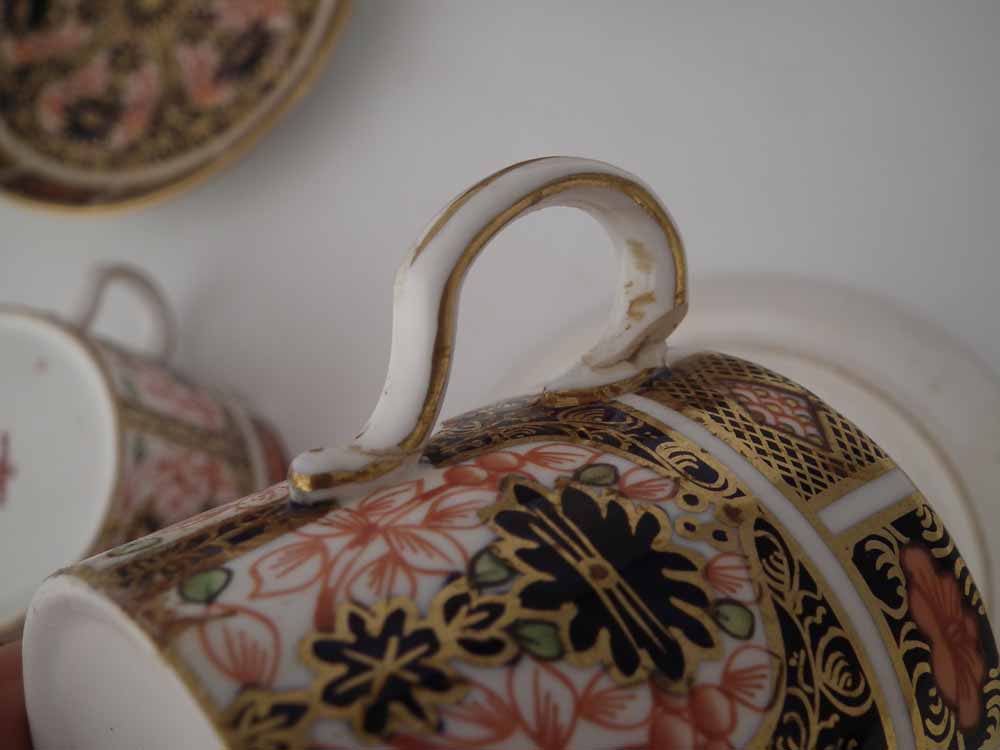 Six Royal Crown Derby coffee cups and saucers, decorated with imari 1128 pattern, date codes ranging - Image 4 of 4