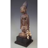 Yoruba Ibeji figure, 28cm high All lots in this Tribal and African Art Sale are sold subject to V.