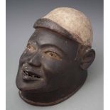 Makonde helmet mask, 21cm high All lots in this Tribal and African Art Sale are sold subject to V.