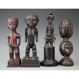 Tabwa figure, Lega multi head figure, a human bird figure possibly Bembe and one other figure
